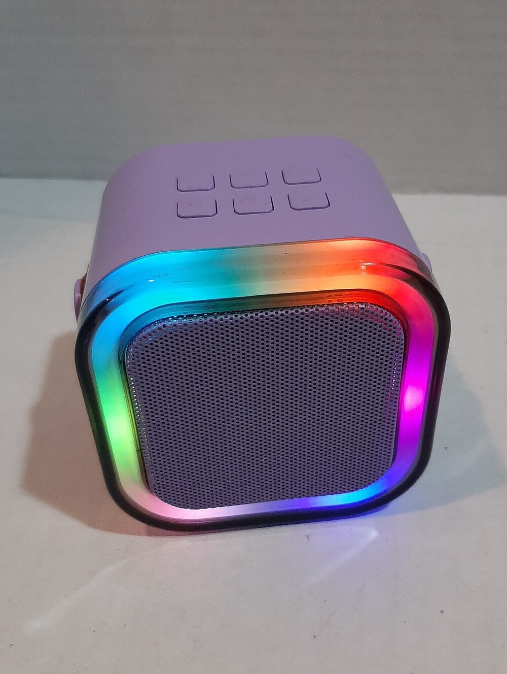 Purple mini wireless Bluetooth speaker and karaoke machine with LED lights